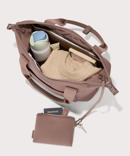 Tote in a pink seen from the top down view showing interior mesh pouch.