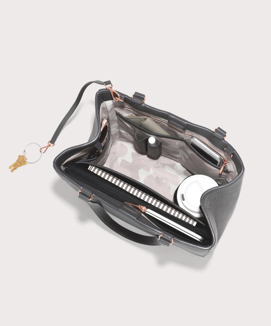 hover - Dagne Dover medium Allyn Tote in grey seen from above, revealing the interior slip pockets and laptop sleeve.
