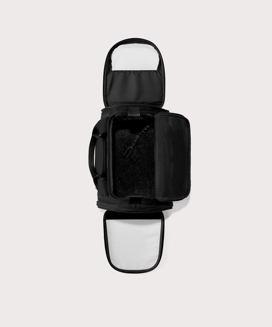 Dagne Dover small Kyoto Pet Carrier in black seen unzipped, top down view.
