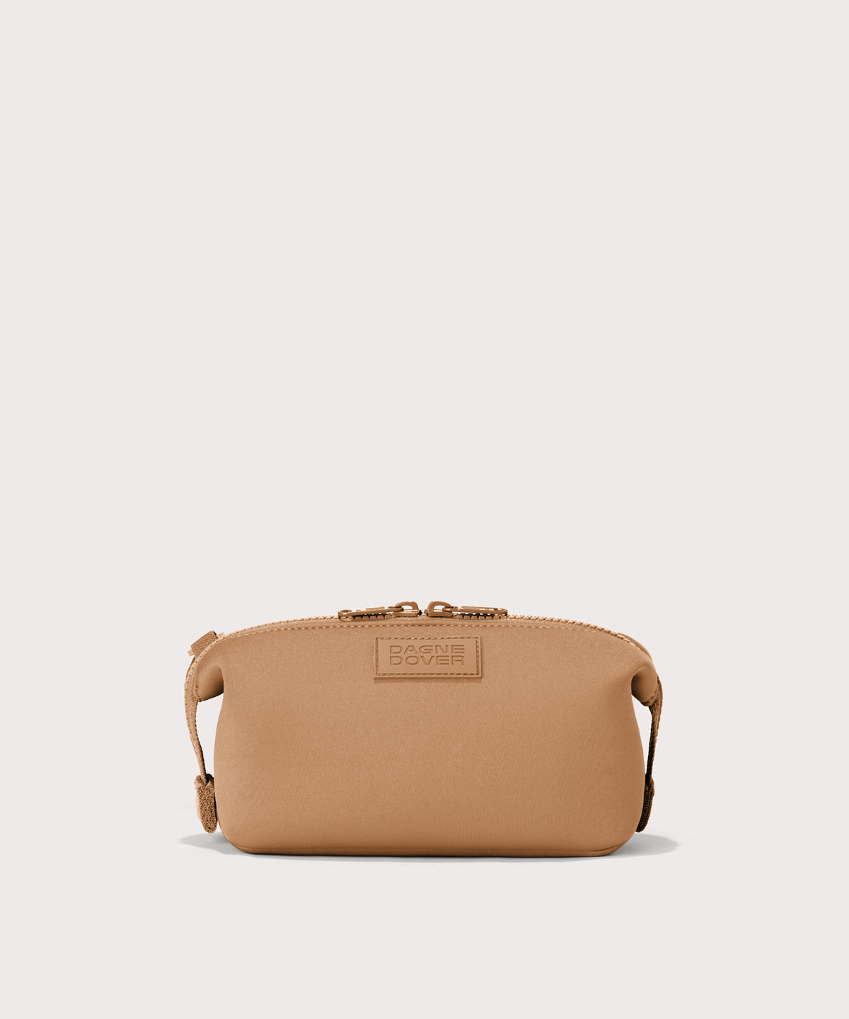 Dagne Dover Small Hunter Toiletry Bag in camel.