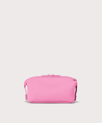 Dagne Dover Small Hunter Toiletry Bag in a true bubble gum pink seen from the back.