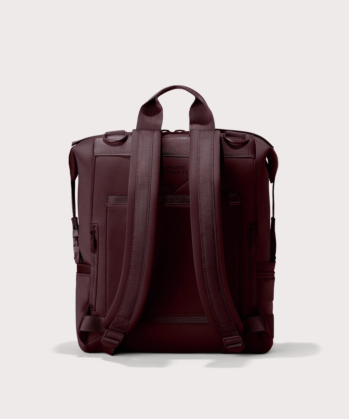 Dagne Dover Large Indi Diaper Backpack in a deep brown with purple undertones seen from the back.