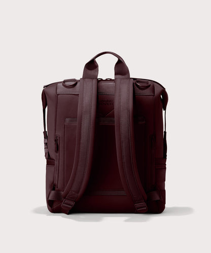 Dagne Dover Large Indi Diaper Backpack in a deep brown with purple undertones seen from the back.