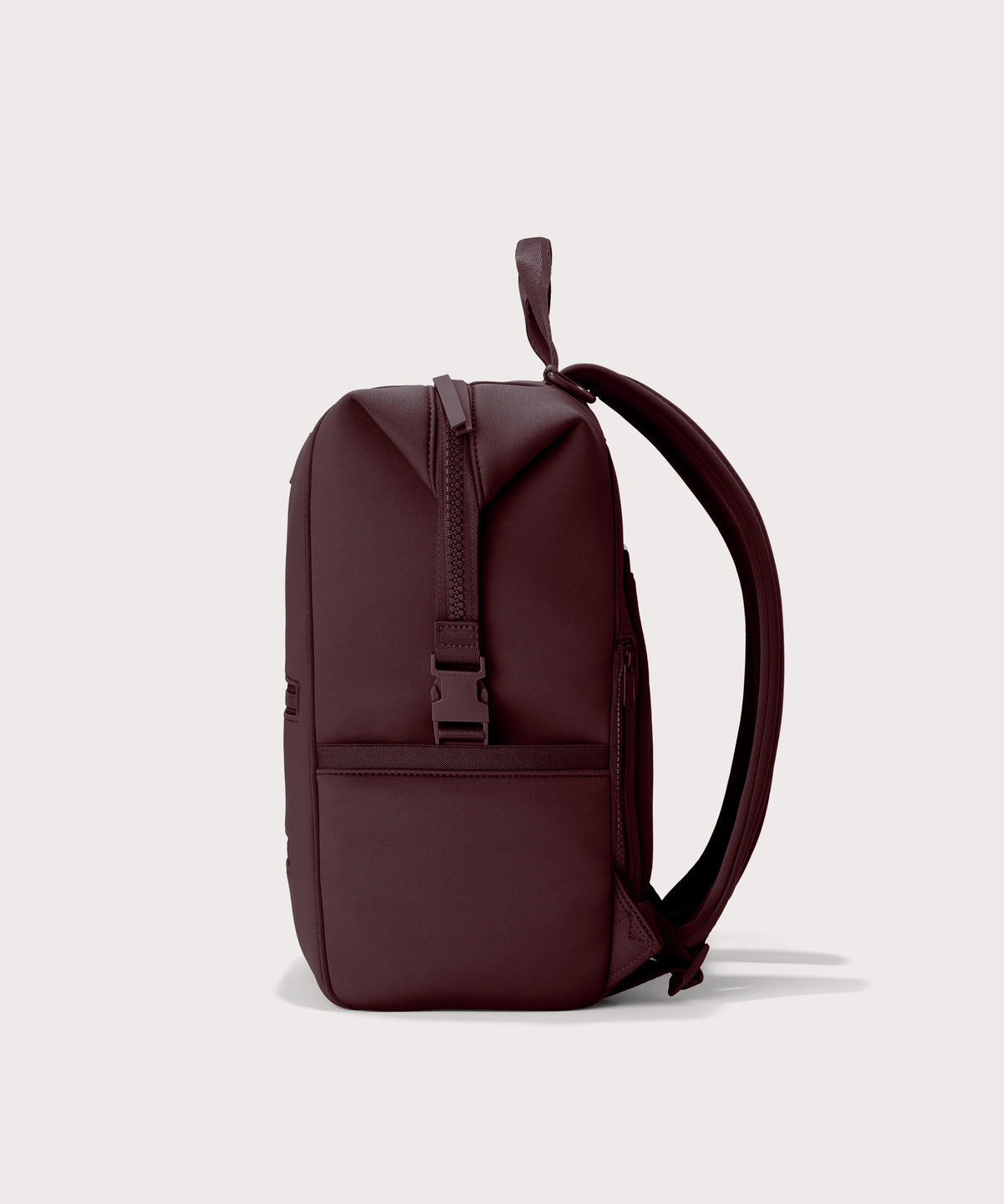 Dagne Dover Large Indi Diaper Backpack in a deep brown with purple undertones seen from the side.