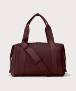 Dagne Dover Large Landon Carryall in a deep brown with purple undertones.