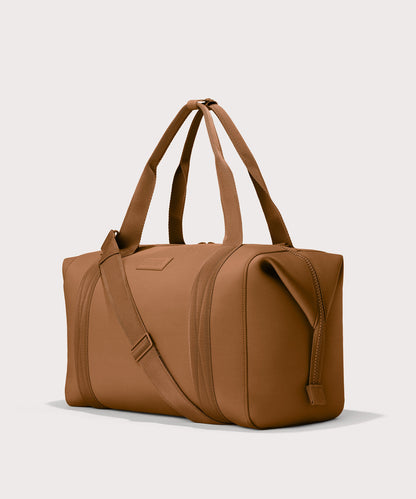 Extra Large Landon Carryall in a a saturated, warm medium-brown with burnt orange undertones, side angle view