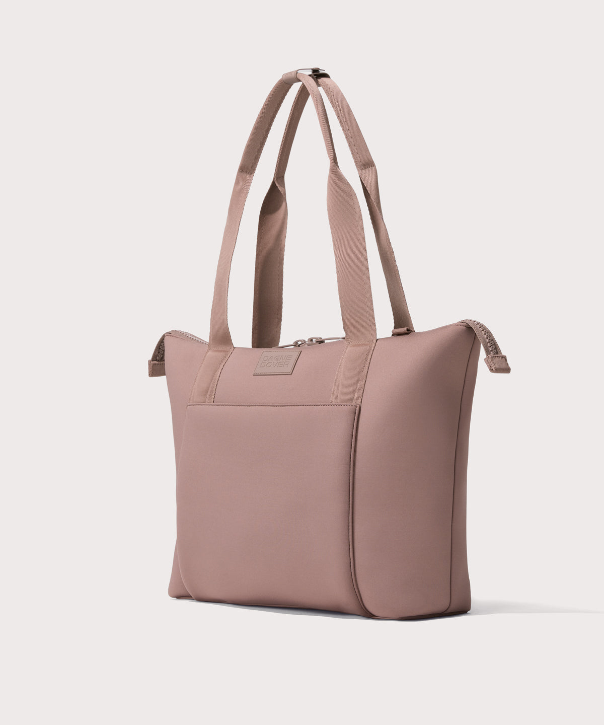 Tote in a pink seen from the angle view.