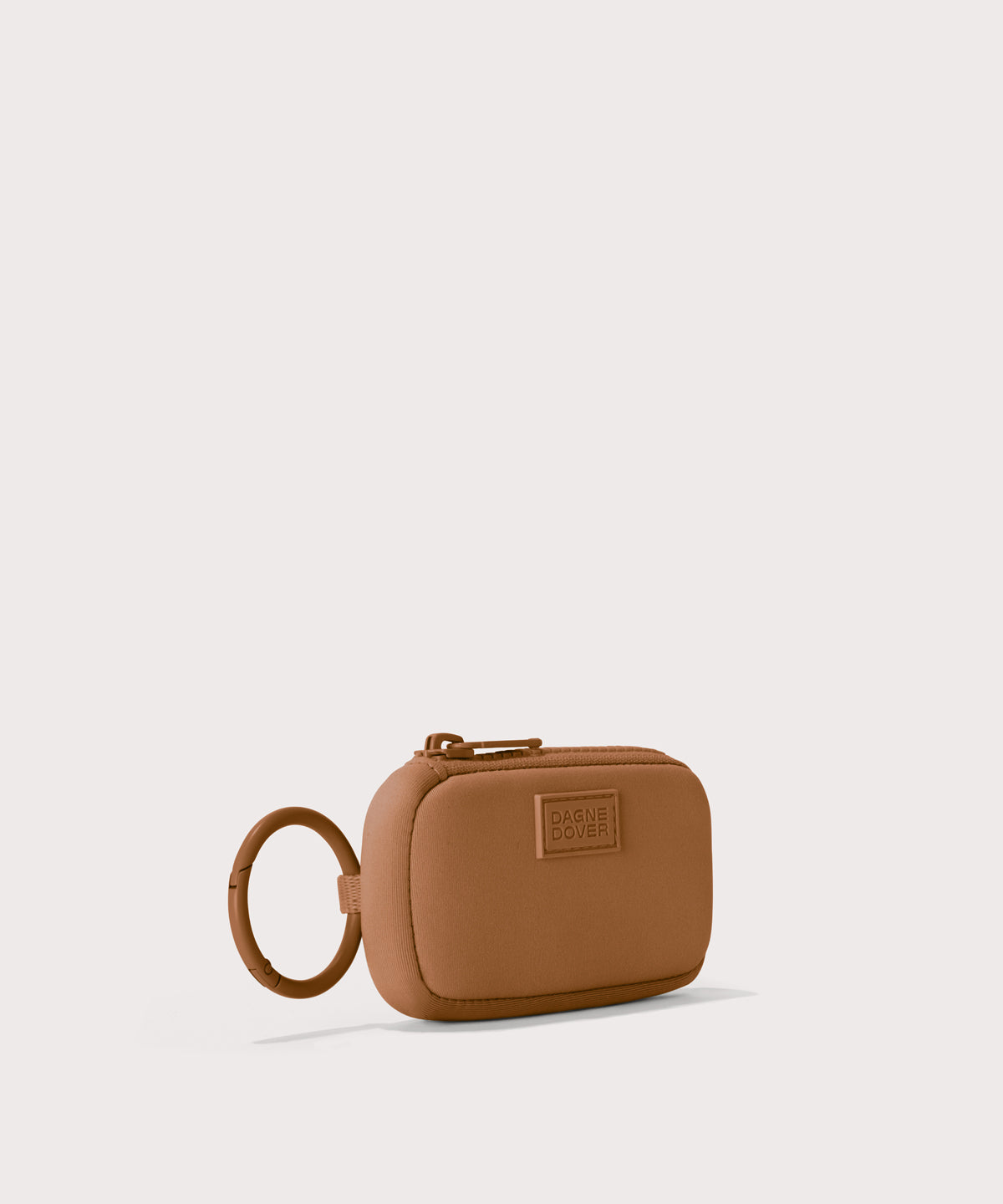 Mara Keychain in a saturated, warm medium-brown with burnt orange undertones. side angle view