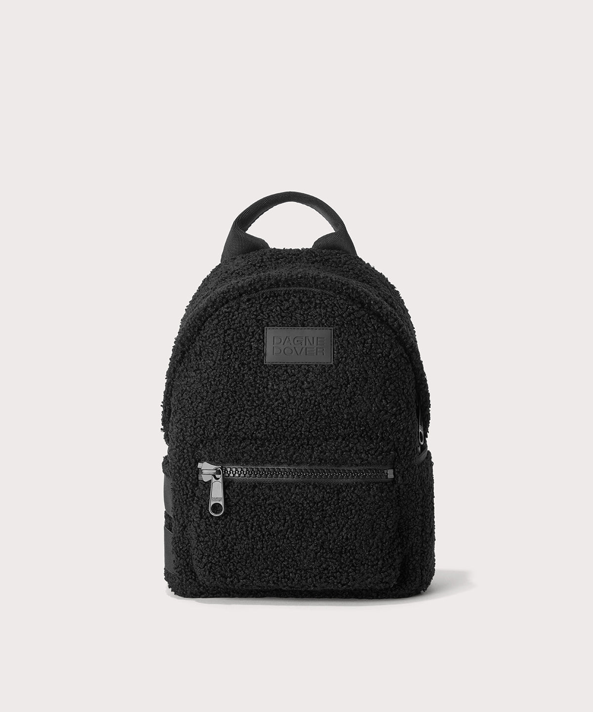 Dakota Small backpack pack in a black In a Faux Shearling a soft, wool-like plush made with recycled materials