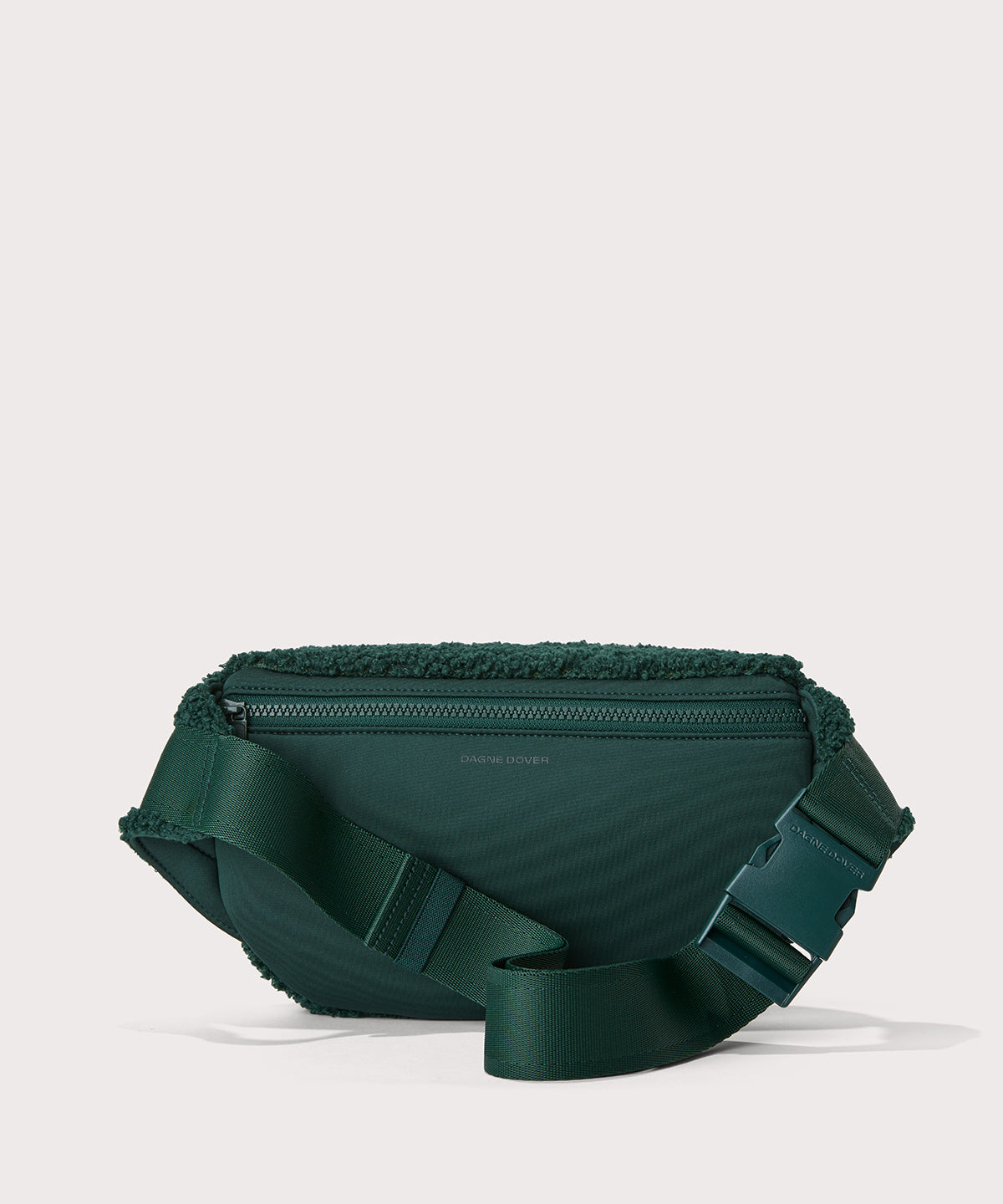 Jax fanny pack in a saturated, jewel-toned deep green with bold blue undertones. Back View. In a Faux Shearling a soft, wool-like plush made with recycled materials