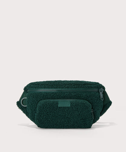 Jax fanny pack in a saturated, jewel-toned deep green with bold blue undertones. In a Faux Shearling a soft, wool-like plush made with recycled materials