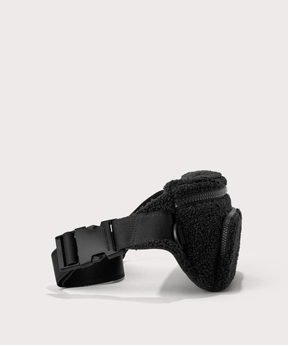 Jax fanny pack in a black. Side angle view In a Faux Shearling a soft, wool-like plush made with recycled materials