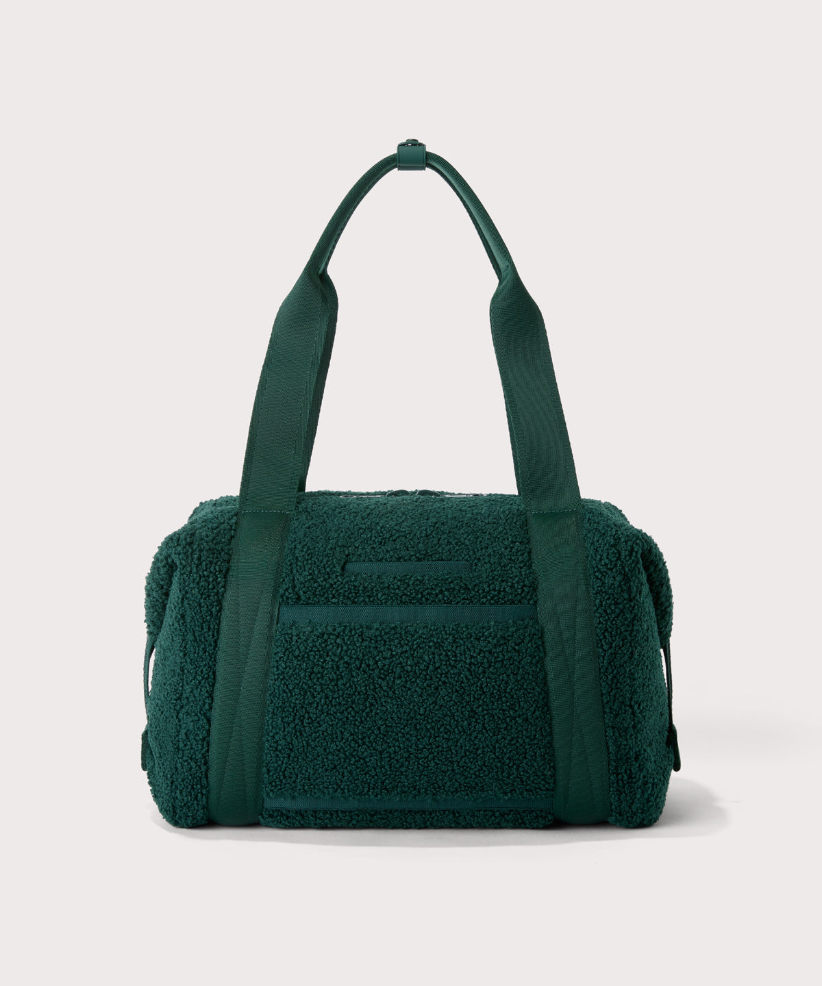 Medium landon carryall in a saturated, jewel-toned deep green with bold blue undertones. Back view. In a Faux Shearling a soft, wool-like plush made with recycled materials