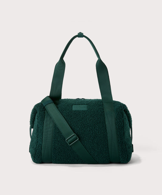 Medium landon carryall in a saturated, jewel-toned deep green with bold blue undertones. In a Faux Shearling a soft, wool-like plush made with recycled materials