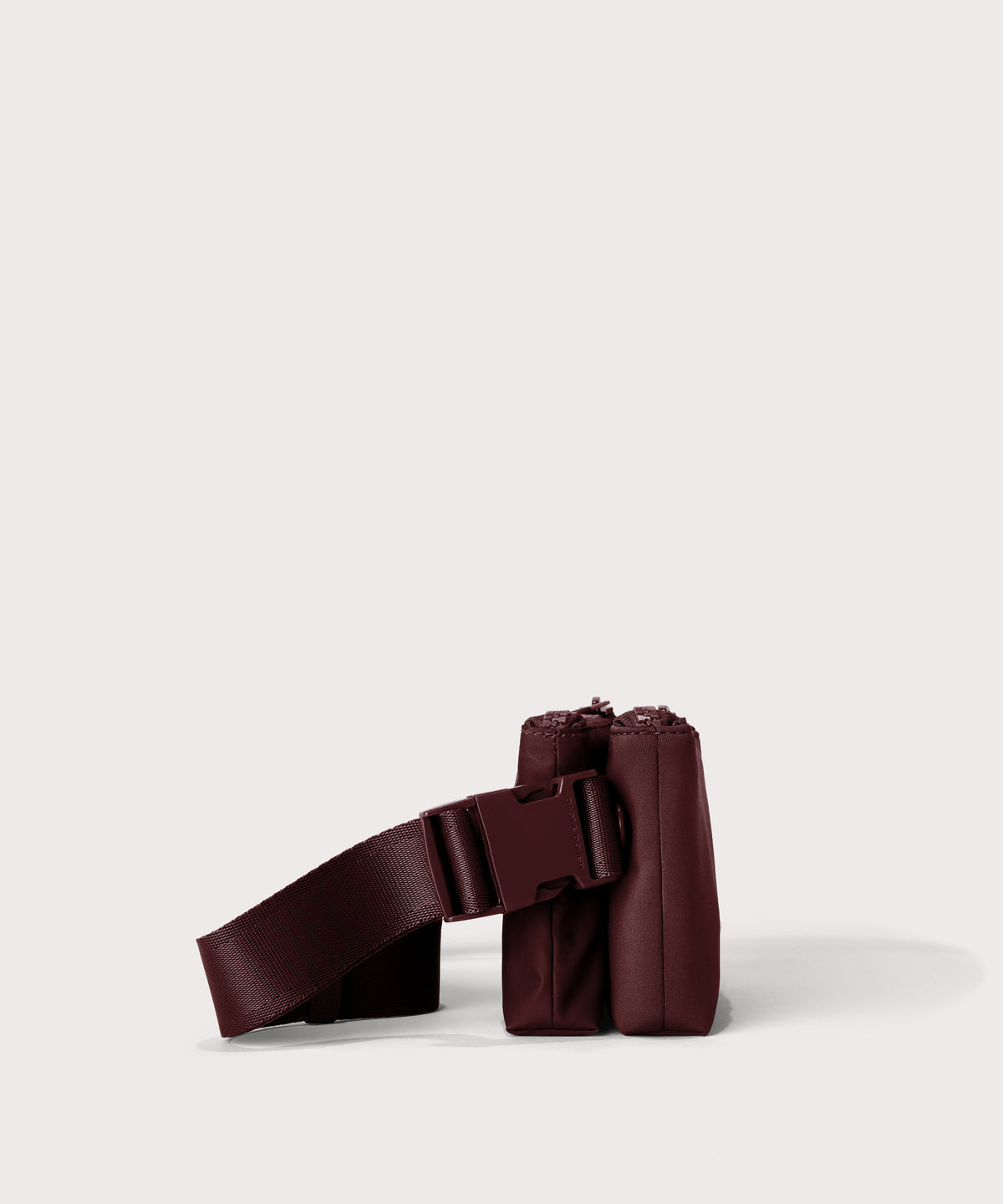Dagne Dover Bennie Sling in a deep brown with purple undertones seen from the side.