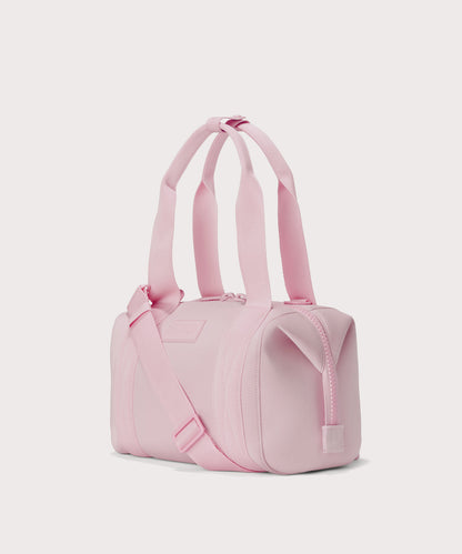 Small Landon Carryall in a cool, powdery pink with soft grey undertones, side angle view