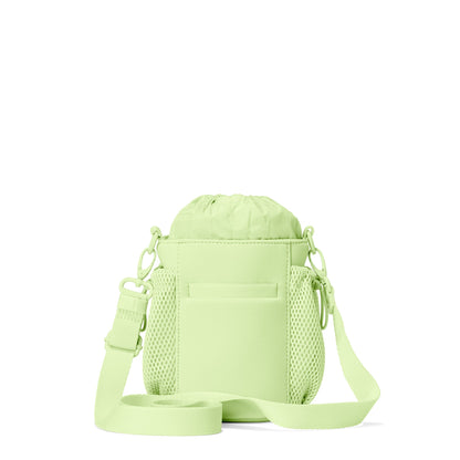Dagne Dover Sloan Water Bottle Sling in a vibrant, creamy green seen from the back.