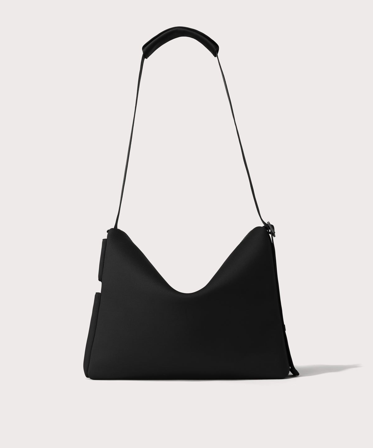 Large Shoulder bag in a black seen from the back view.