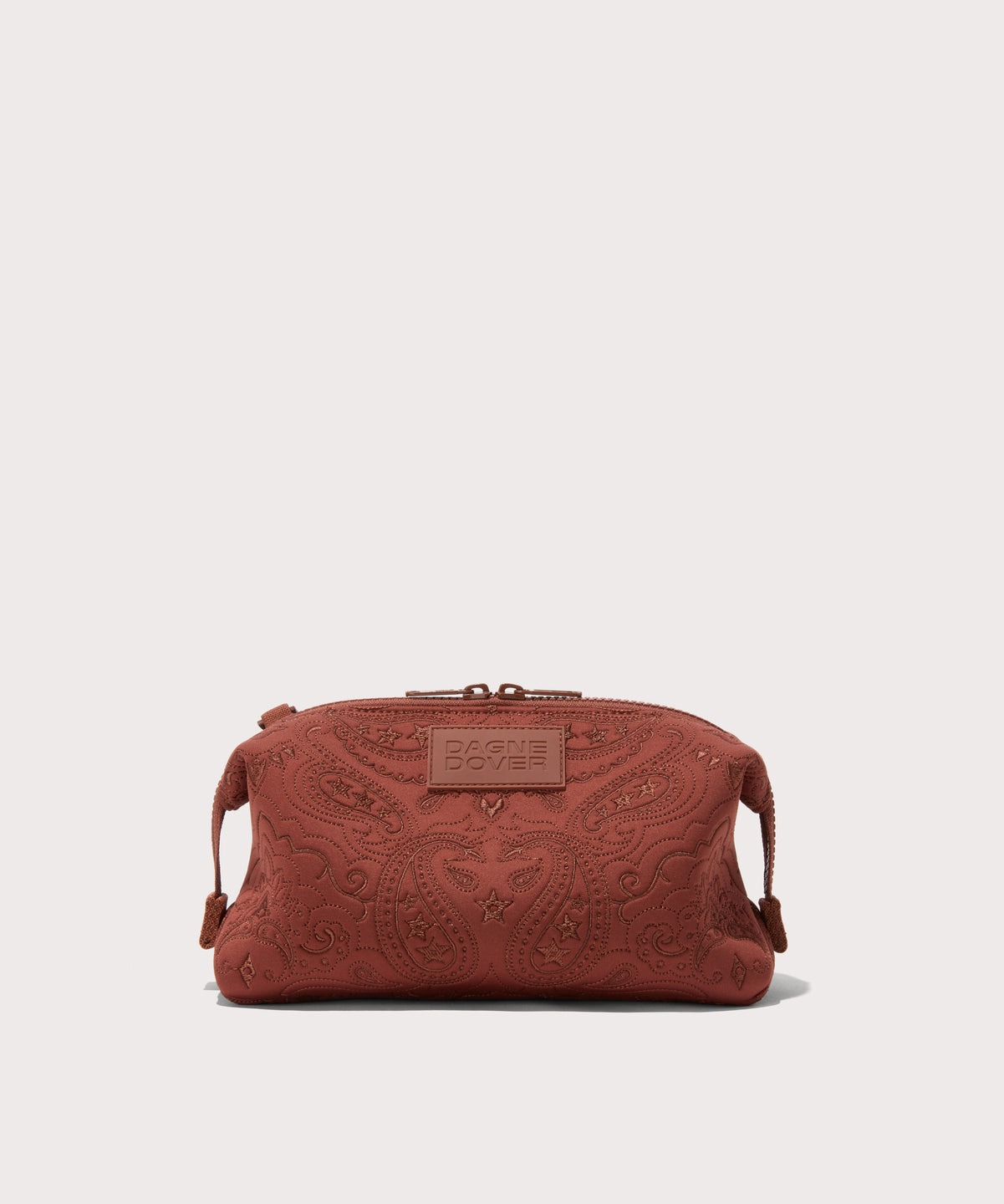 Dagne Dover Large Hunter Toiletry Bag in a rich, warm brown with an embroidered paisley print.
