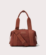 Dagne Dover Small Landon Carryall in a rich, warm brown with an embroidered paisley print.