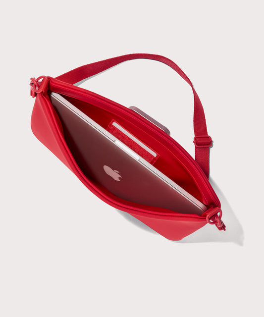 Large Shoulder bag in a fiery, saturated red leaning toward orange seen from the top down view showing interior.