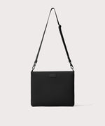 14 inch laptop shoulder bag in a black seen from the front view.