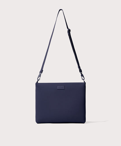 14 inch laptop shoulder bag in navy blue seen from the front view.