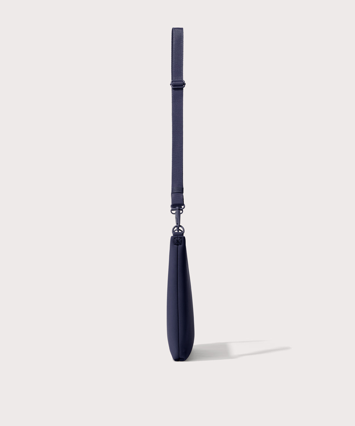 14 inch laptop shoulder bag in navy blue seen from the side view .