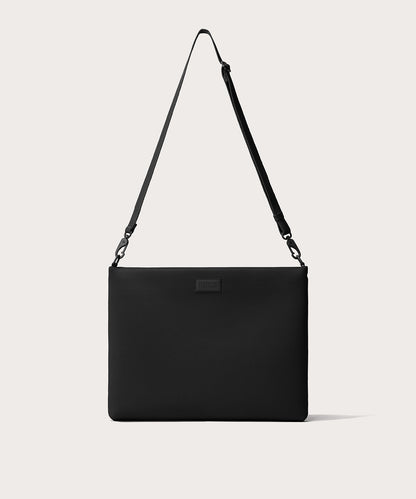 16 inch laptop shoulder bag in a black seen from the front view.