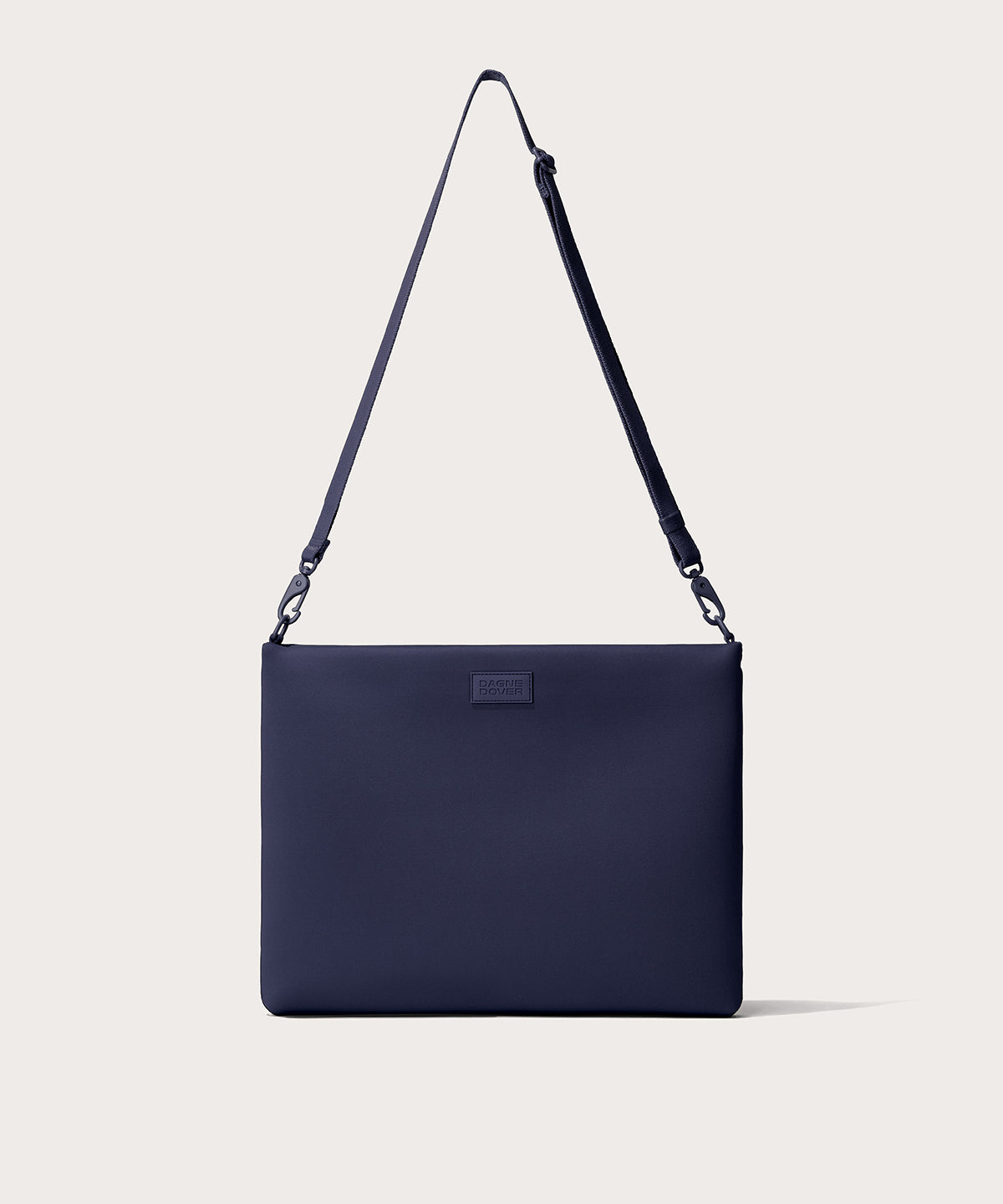 16 inch laptop shoulder bag in navy blue seen from the front view.