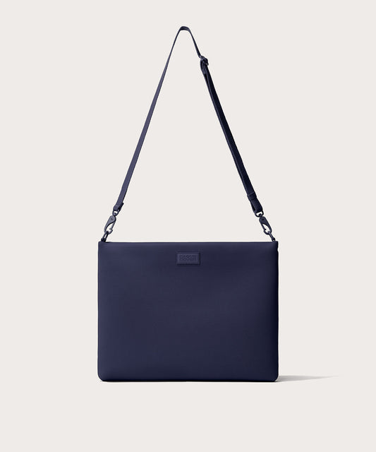 16 inch laptop shoulder bag in navy blue seen from the front view.