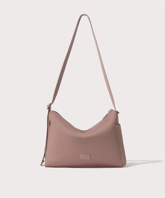 Shoulder bag in a pink seen from the front view.