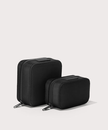 Dagne Dover Small and Large Frankie Jewelry Cases in black standing next to one another.