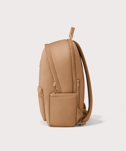 Dagne Dover large Dakota Neoprene Backpack in camel seen from the side.