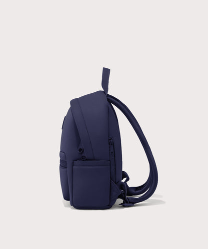 Dagne Dover small Dakota Neoprene Backpack in dark blue seen from the side.