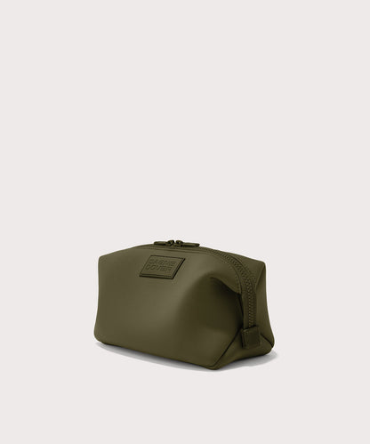 Dagne Dover Large Hunter Toiletry Bag in dark moss seen from an angle.