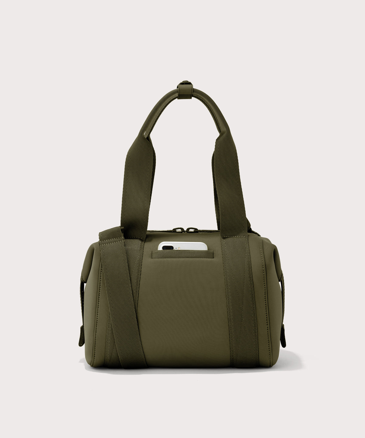 small Landon Carryall in dark green, displaying an exterior phone pocket