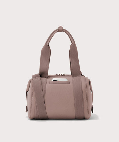small Landon Carryall in pink, displaying an exterior phone pocket