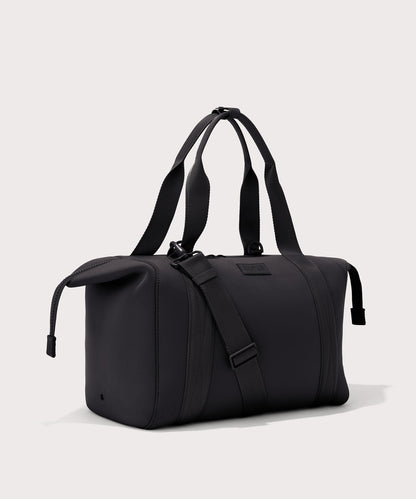 Large Landon Carryall in black with zippers unbuckled