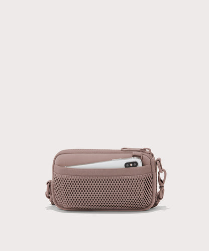 Dagne Dover Mara Phone Sling in pink showing the exterior air mesh slip.