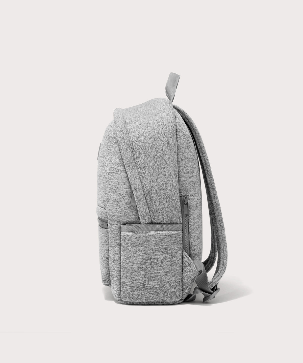 Dagne Dover medium Dakota Neoprene Backpack in grey seen from the side.
