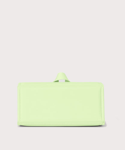Dagne Dover Remi foldable glasses holder in matcha green seen from the back.