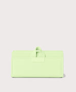 Dagne Dover Remi foldable glasses holder in matcha green.
