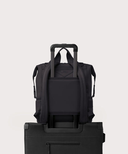 Dagne Dover Large Indi Diaper Backpack in onyx showing the neoprene luggage sleeve.