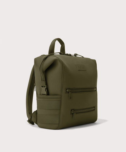 Dagne Dover medium Indi Diaper Backpack in dark moss seen from an angle.
