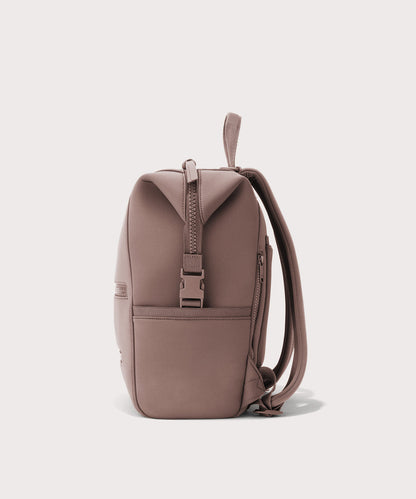 Dagne Dover medium Indi Diaper Backpack in pink seen from the side.