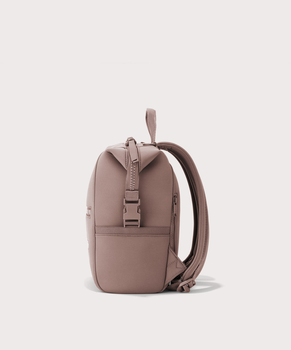 Dagne Dover small Indi Diaper Backpack in pink seen from the side.