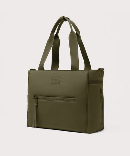 Dagne Dover large Wade Diaper Tote in dark green seen from an angle.