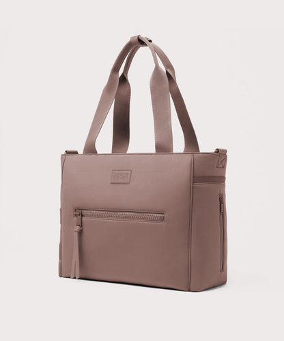 Dagne Dover large Wade Diaper Tote in pink seen from an angle.
