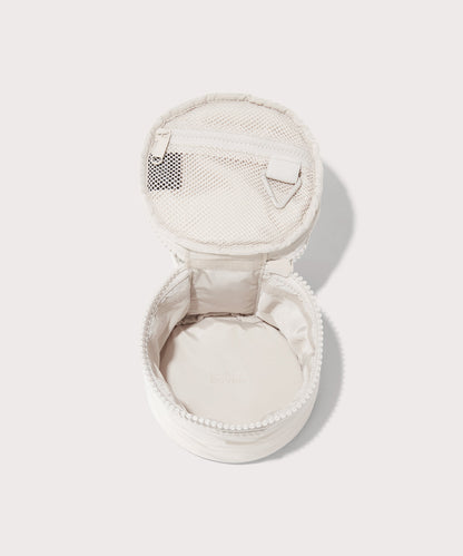 Dagne Dover small Mila Toiletry Pouch in white unzipped.